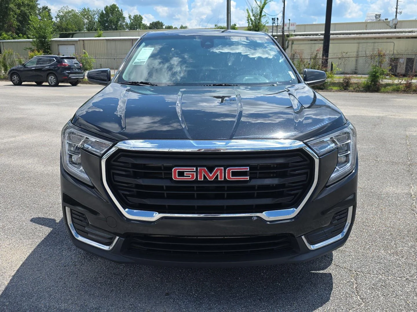 Used 2024 Ebony Twilight Metallic GMC SLE image 10