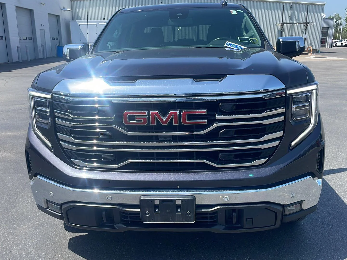 Used 2024 Titanium Rush Metallic GMC SLT image 6