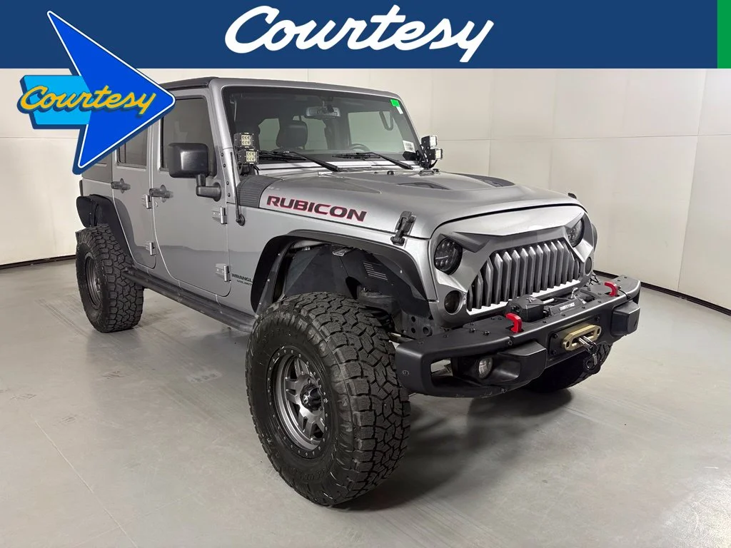Used 2016 Silver Jeep Unlimited Rubicon image 1