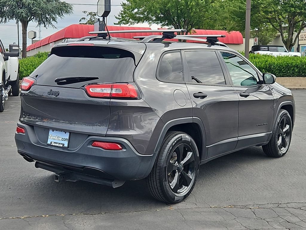 Used 2016 Granite Crystal Metallic Clearcoat Jeep Sport image 6