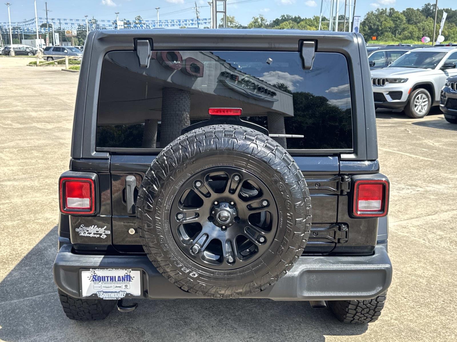Used 2022 Black Jeep Unlimited Sport image 6