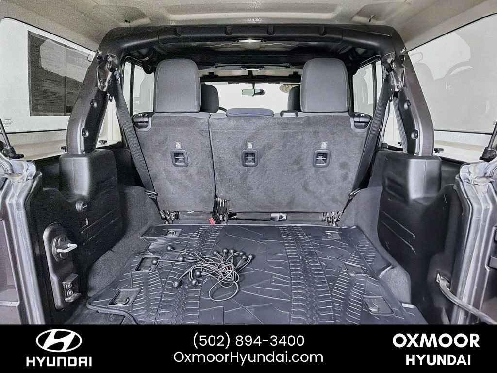 Used 2018 Granite Crystal Metallic Clearcoat Jeep Sport image 24