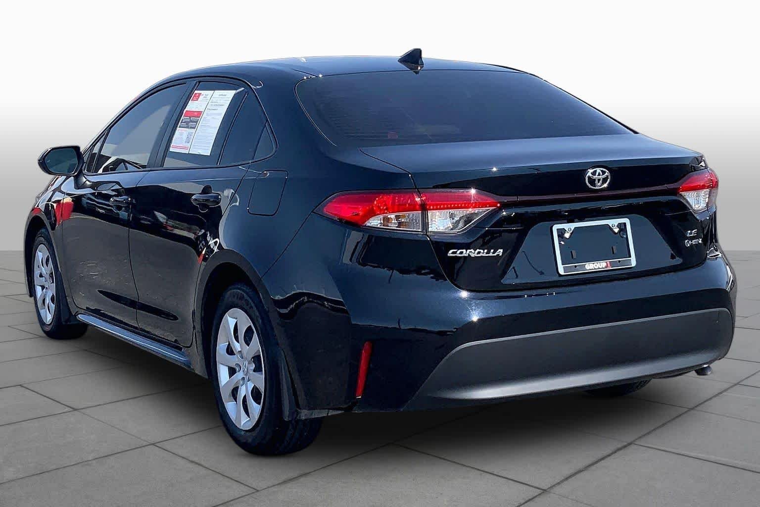 Used 2026 Midnight Black Metallic Toyota Hybrid LE image 12