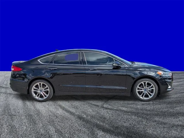 Certified Used 2020 Agate Black Metallic Ford Titanium image 3