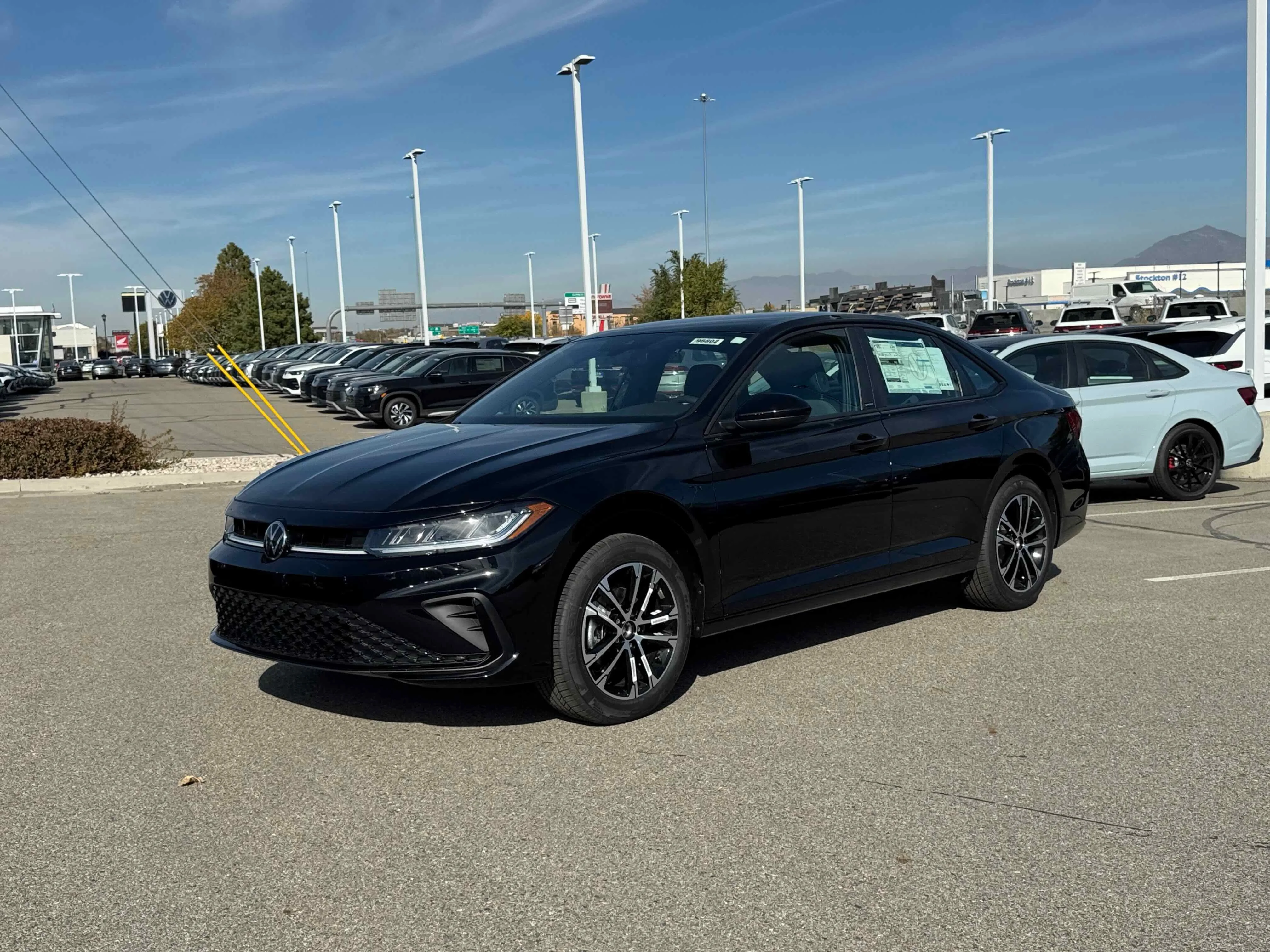 New 2026 Deep Black Volkswagen Sport image 1