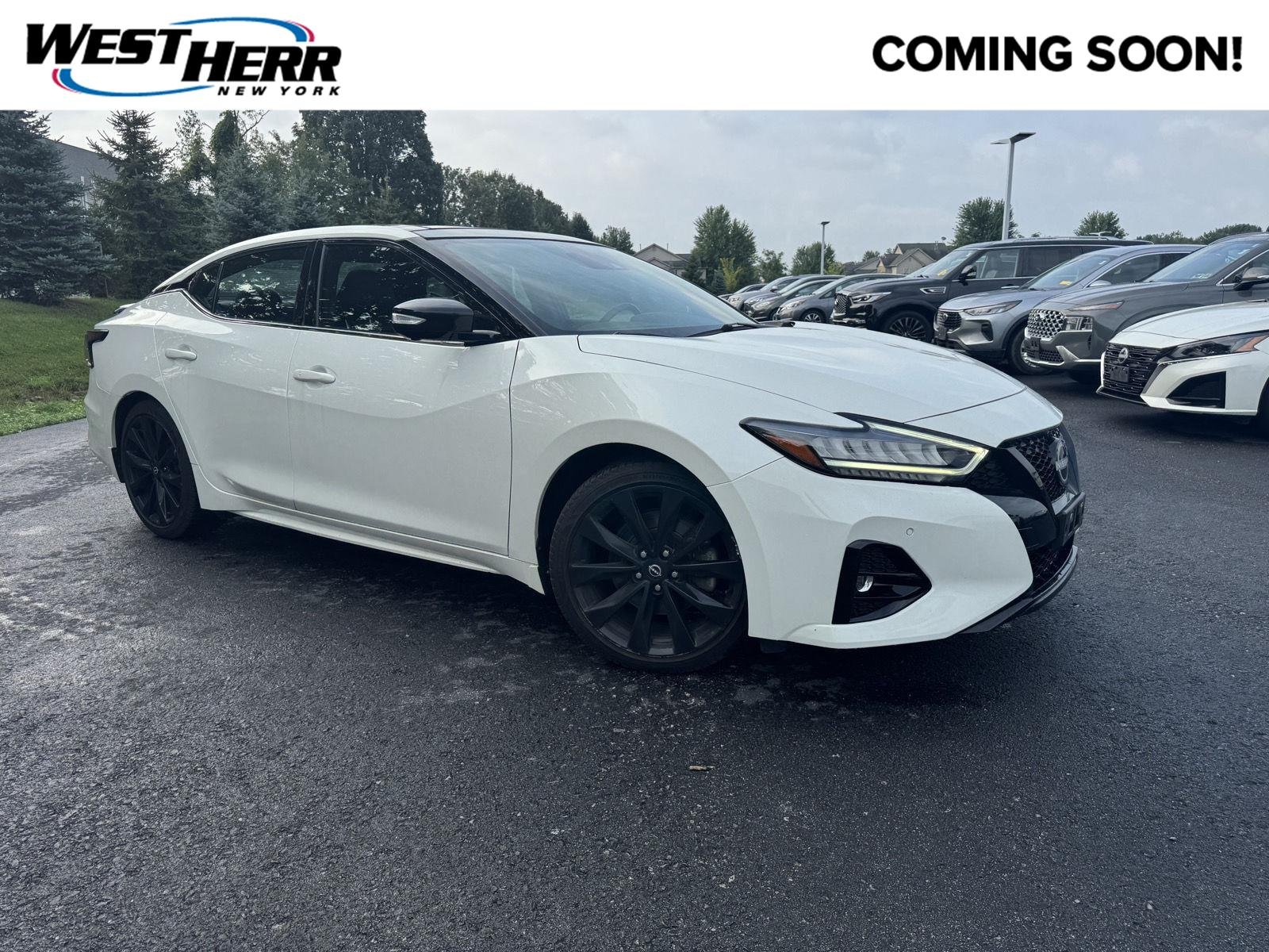 Used 2023 Pearl White Tricoat Nissan SR image 1
