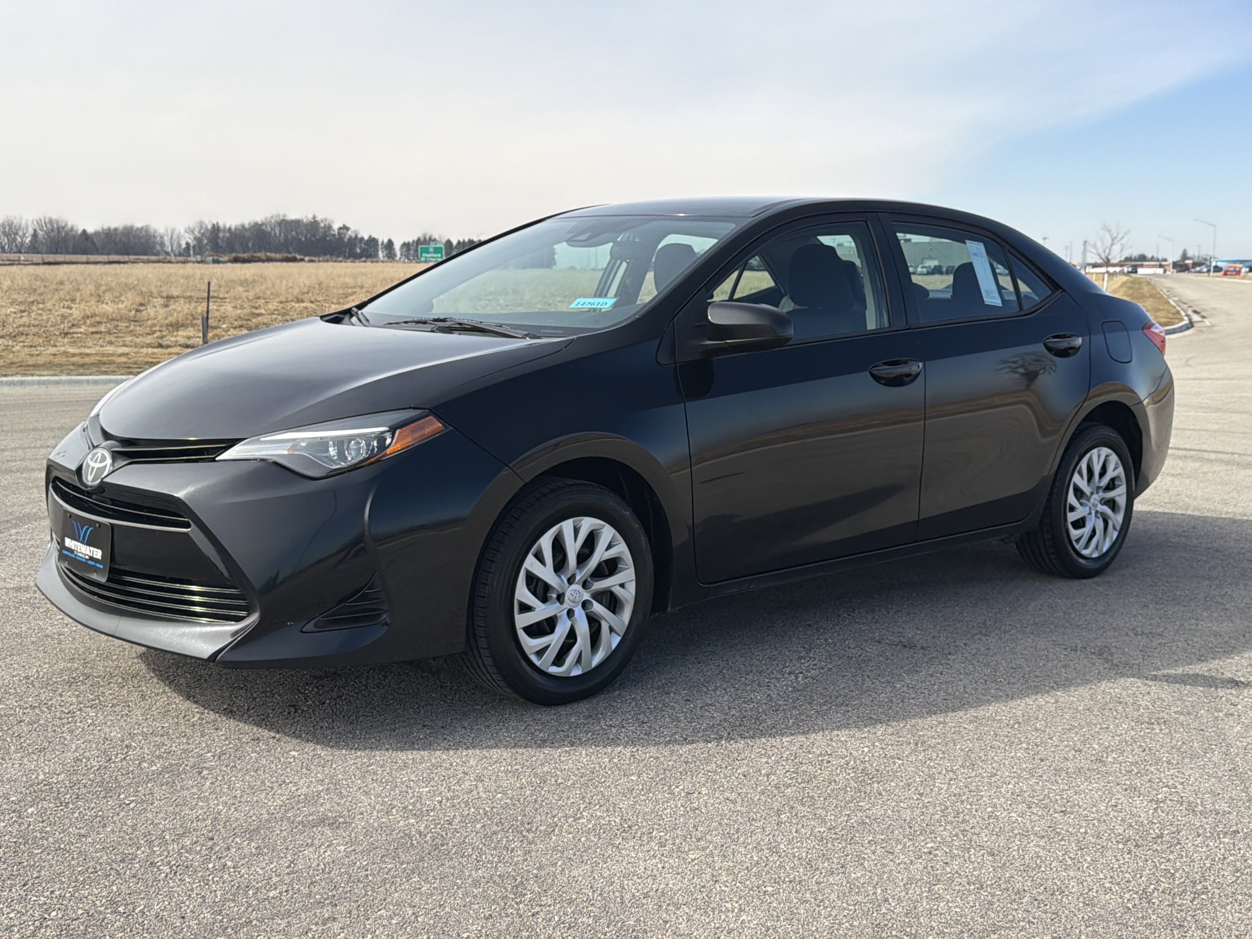 Used 2019 Toyota Corolla LE with VIN 5YFBURHE0KP925355 for sale in Burnsville, Minnesota