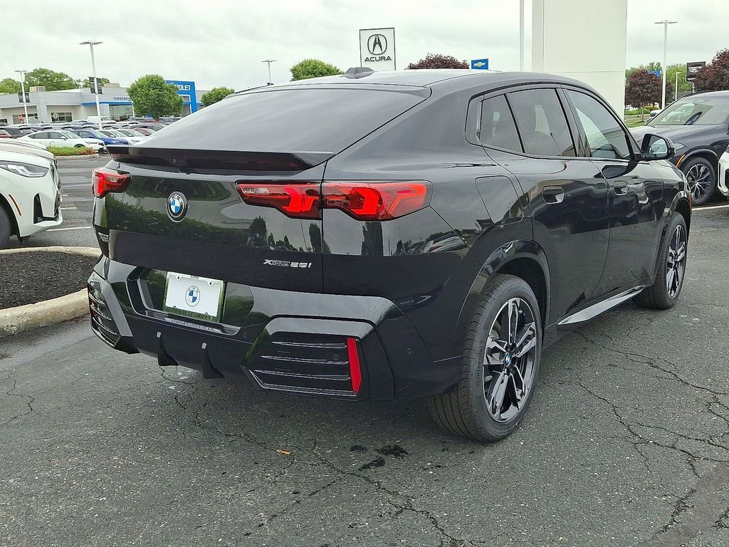 New 2026 Black Sapphire Metallic BMW xDrive28i image 4