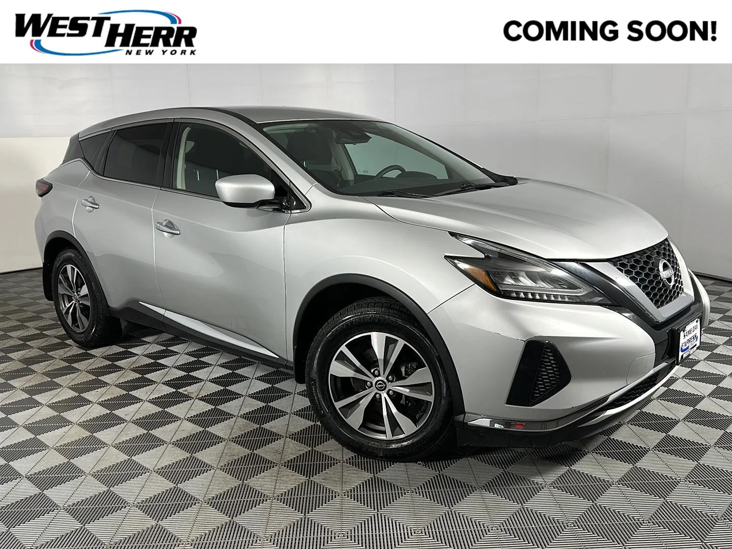 Used 2023 Brilliant Silver Metallic Nissan S image 1