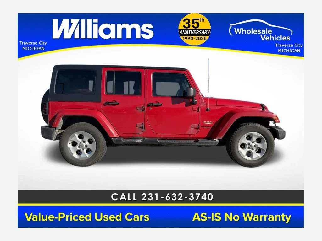 Used 2013 Flame Red Jeep Unlimited Sahara image 1