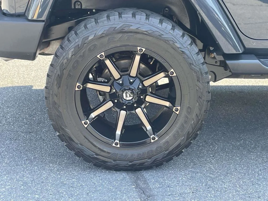 Used 2016 Black Jeep Unlimited Sahara image 13