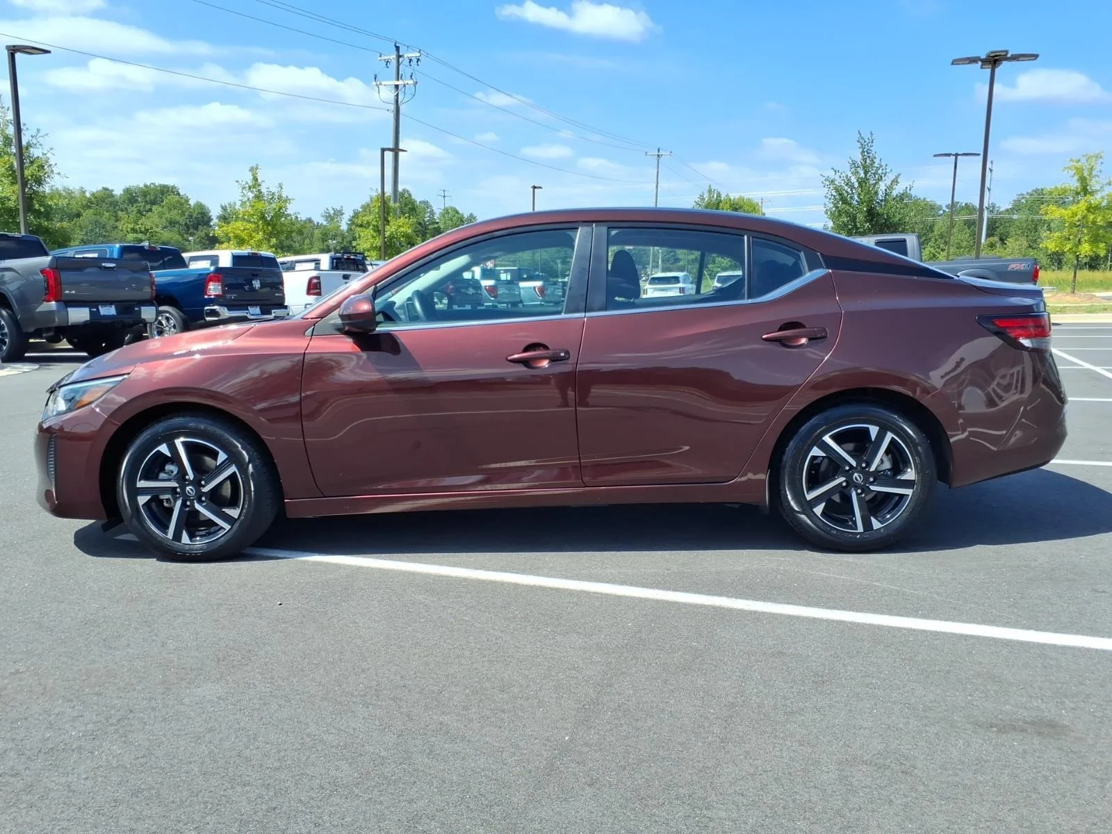 Used 2025 Rosewood Metallic Nissan SV image 3