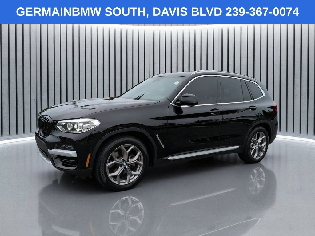 Used 2021 Jet Black BMW sDrive30i image 1