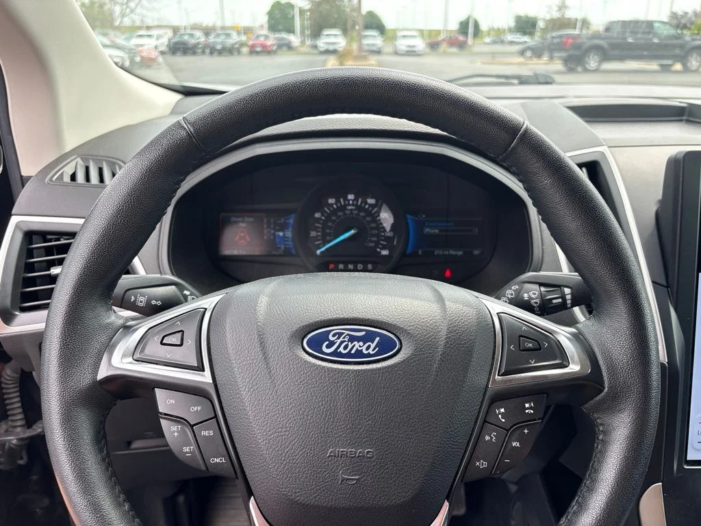 Used 2024 Agate Black Metallic Ford SEL image 14