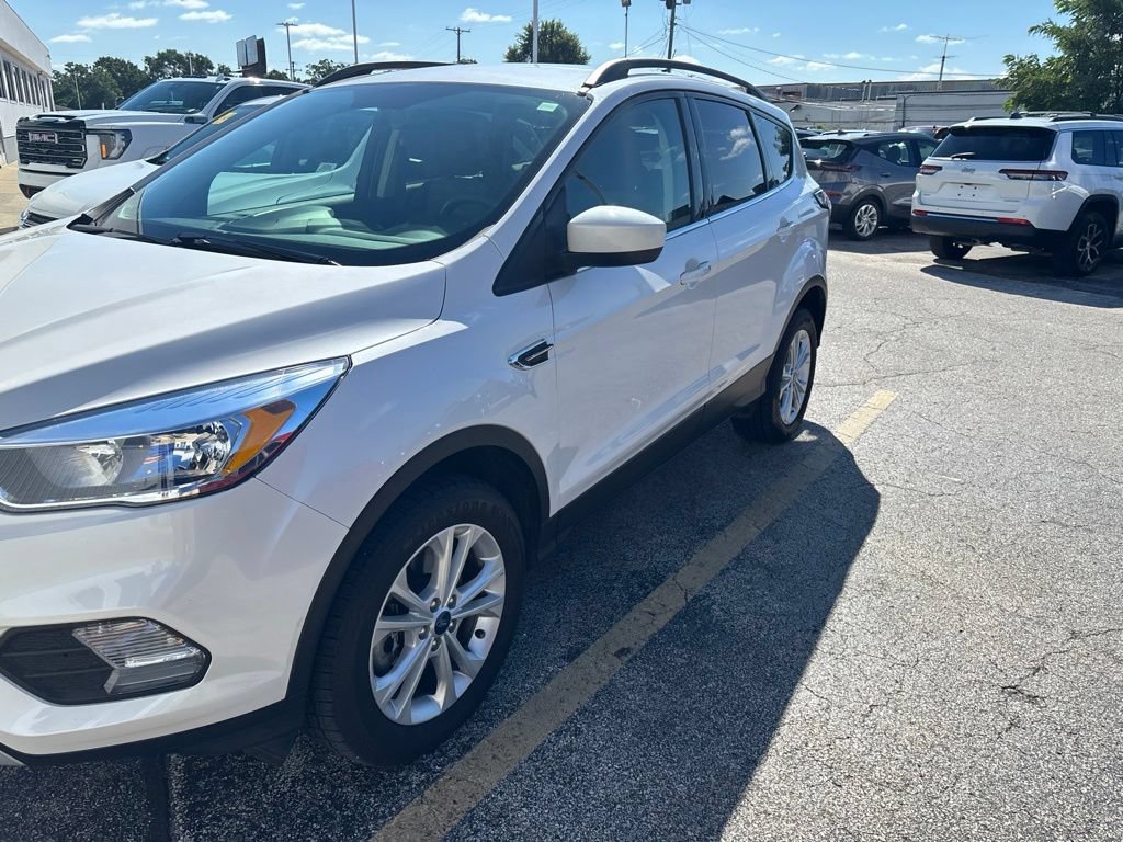 Used 2018 Ford Escape SE with VIN 1FMCU9GD3JUC02741 for sale in Muskegon, MI