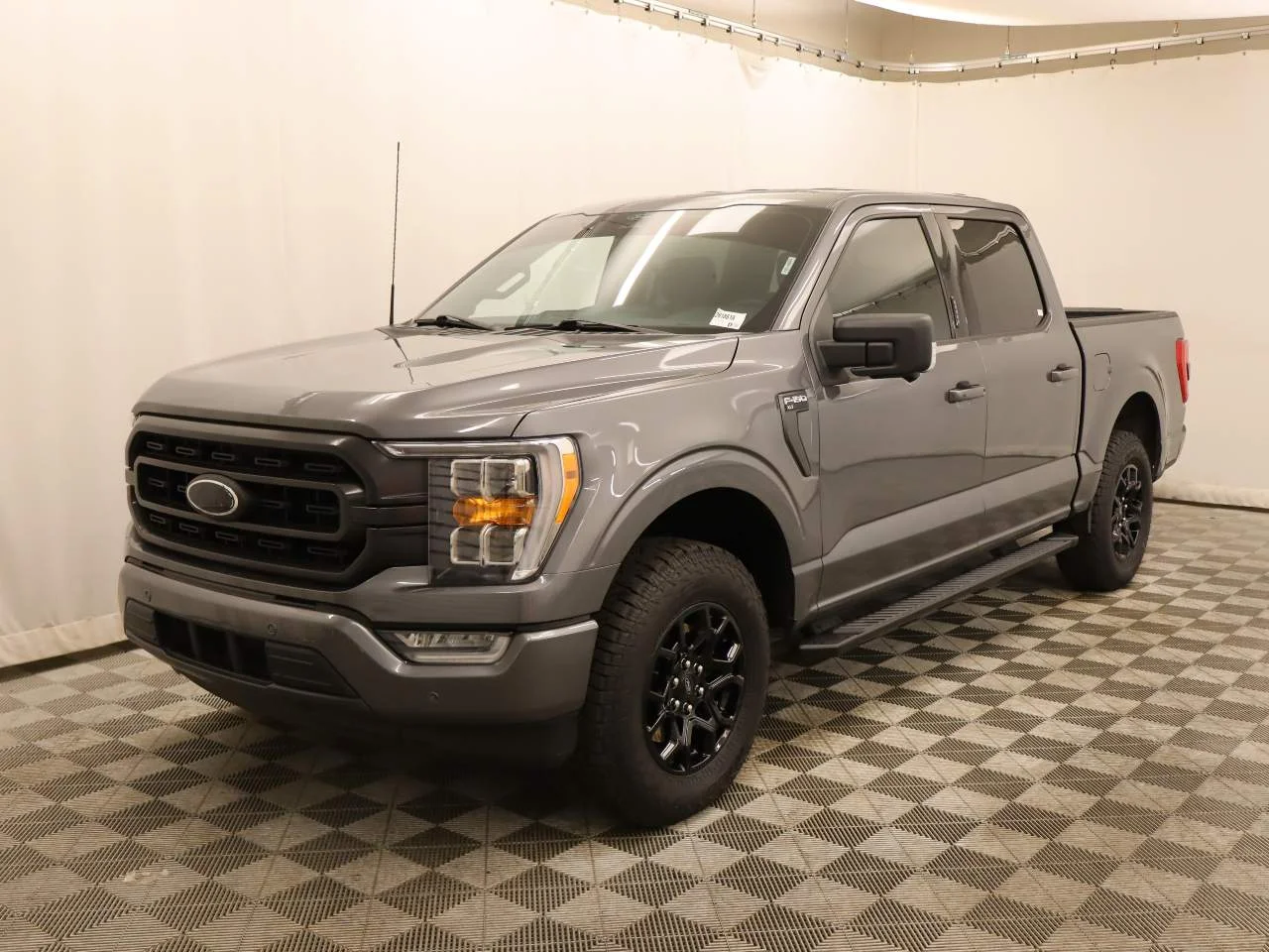 Used 2021 Carbonized Gray Ford XLT Crew Cab image 1