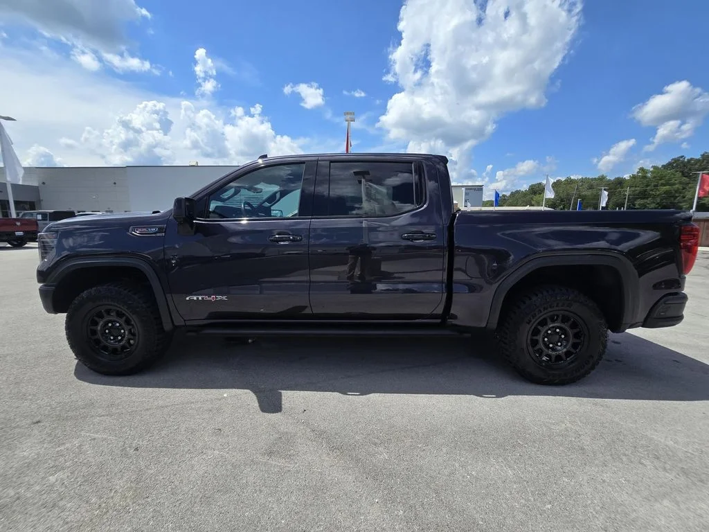 Used 2023 Titanium Rush Metallic GMC AT4X image 4