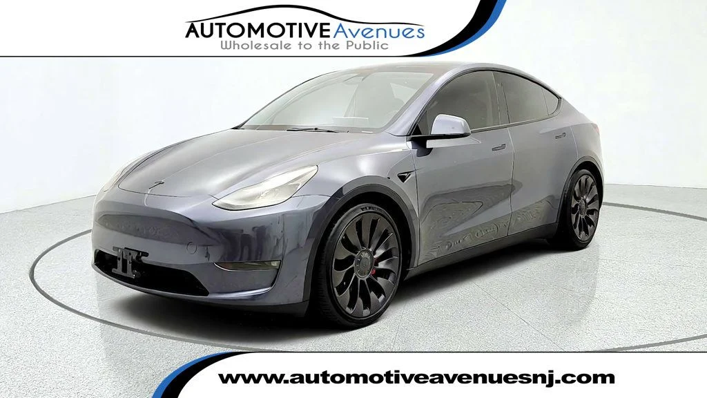 Used 2023 Midnight Silver Metallic Tesla Performance AWD image 1