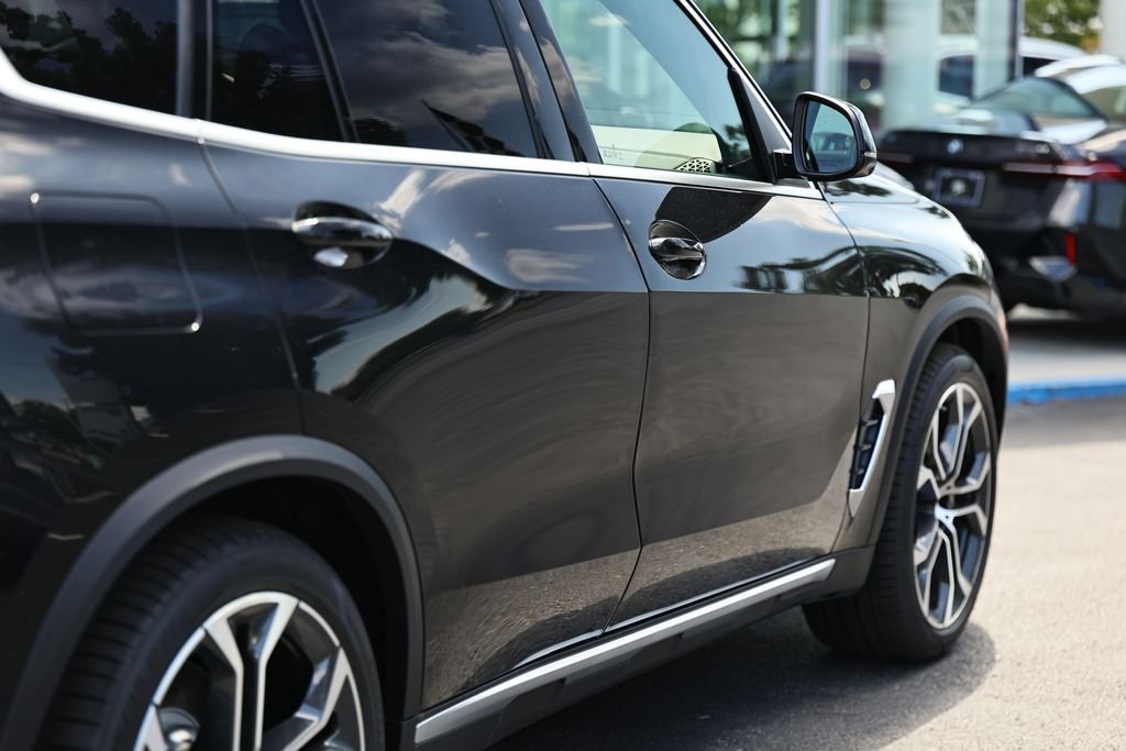 New 2026 Black Sapphire Metallic BMW xDrive50e image 8