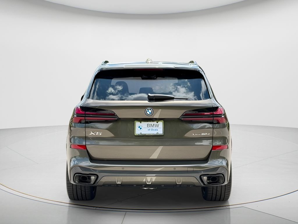 New 2026 Manhattan Green Metallic BMW xDrive50e image 5