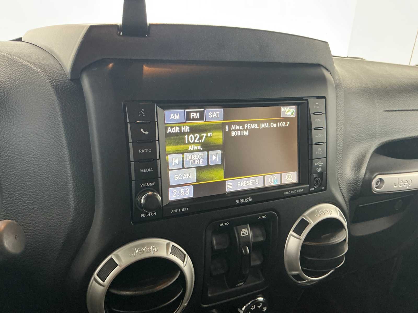 Used 2016 Black Clearcoat Jeep Sahara image 13