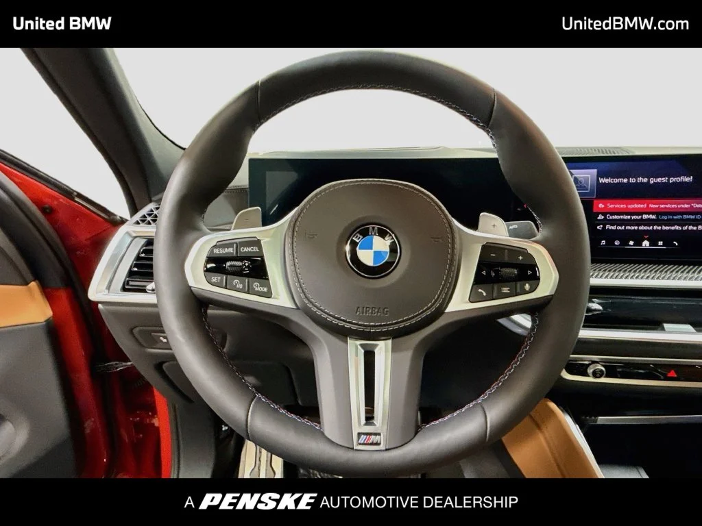 New 2026 Melbourne Red Metallic BMW M60i image 13