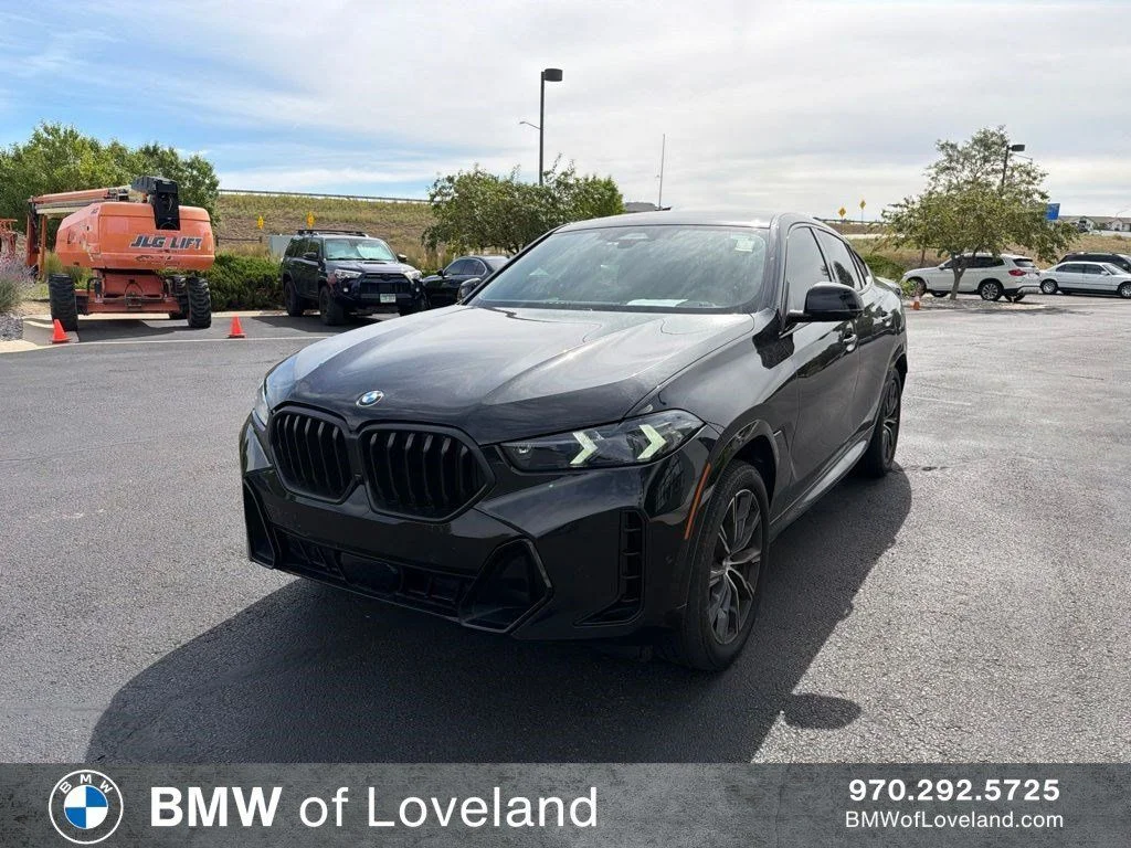 Used 2025 Black BMW xDrive40i image 1