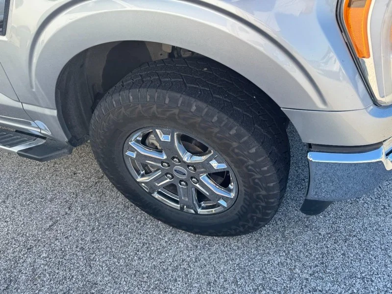 Used 2022 Iconic Silver Metallic Ford XLT 4WD SuperCrew 5.5