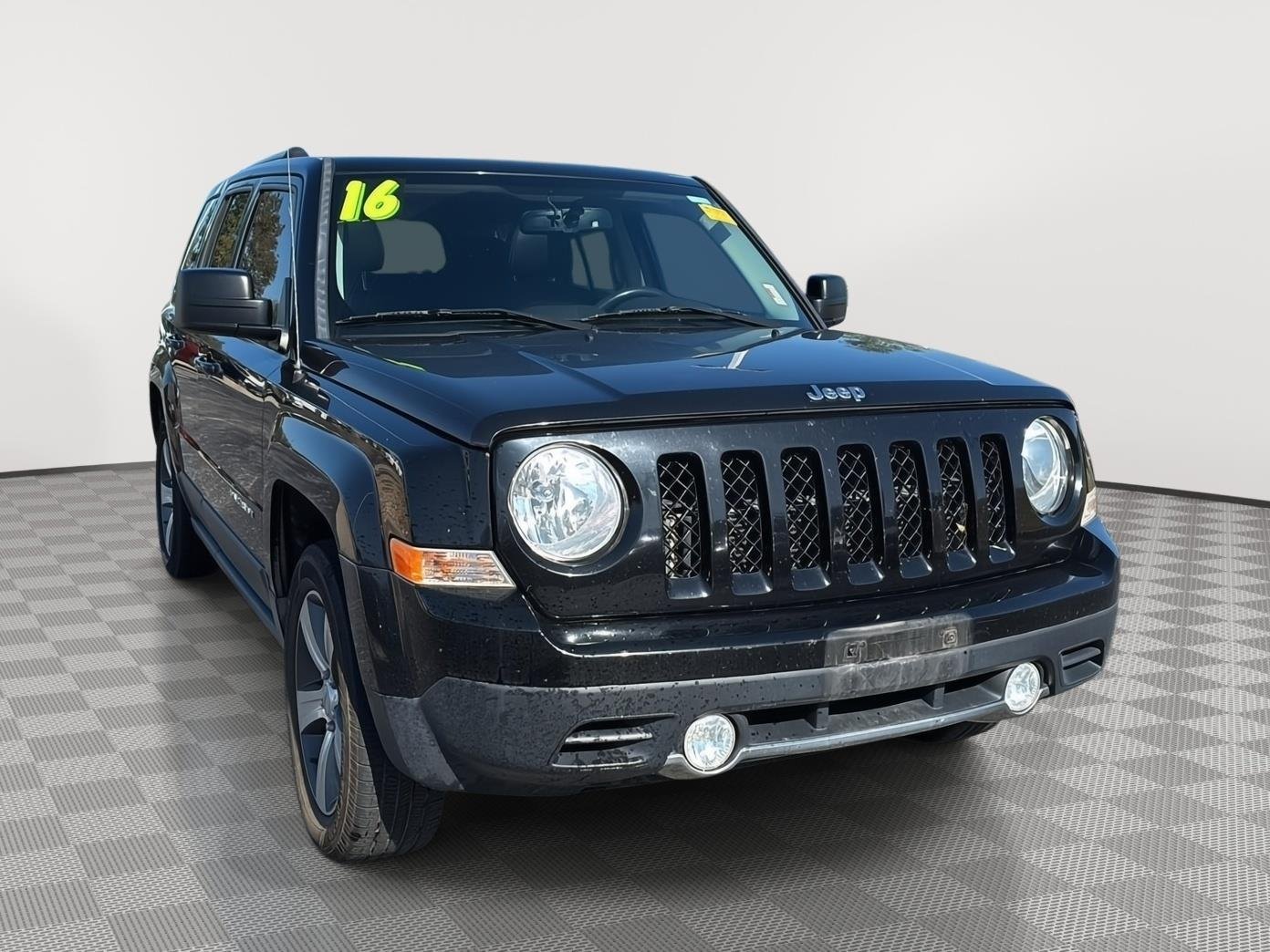 Used 2016 Black Clearcoat Jeep High Altitude Edition image 1