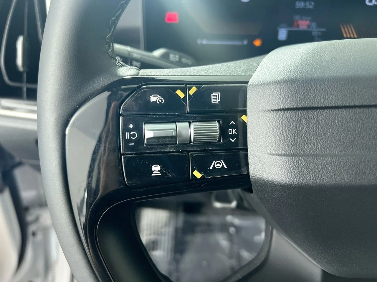 New 2026 Ivory Silver Kia LX image 16