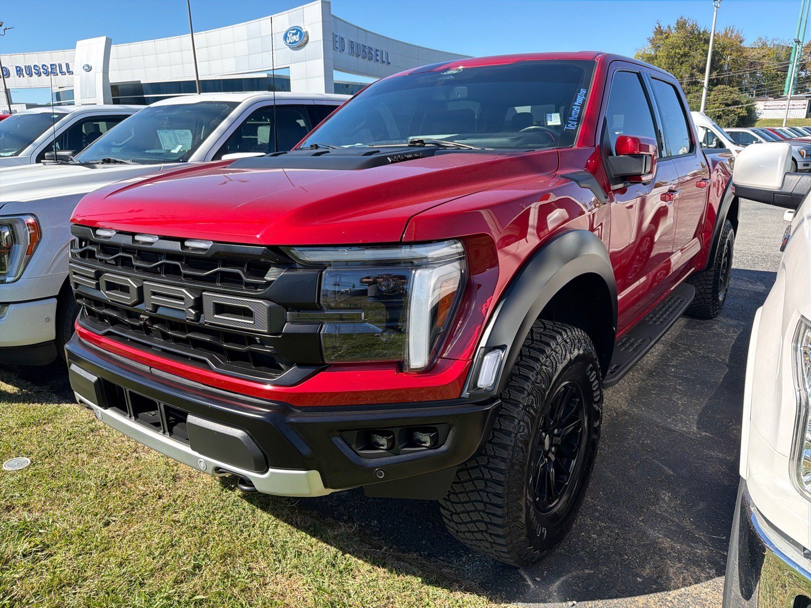 Used 2024 Red Metallic Ford Raptor image 1