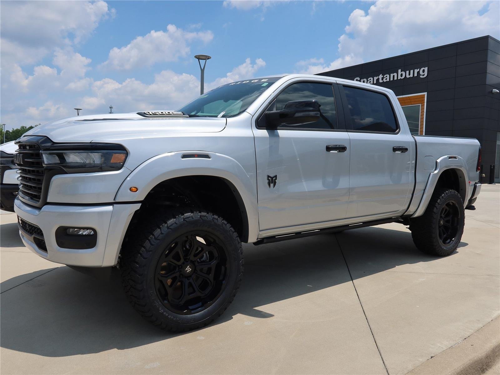 New 2026 Silver Zynith Exterior Paint RAM Laramie image 3