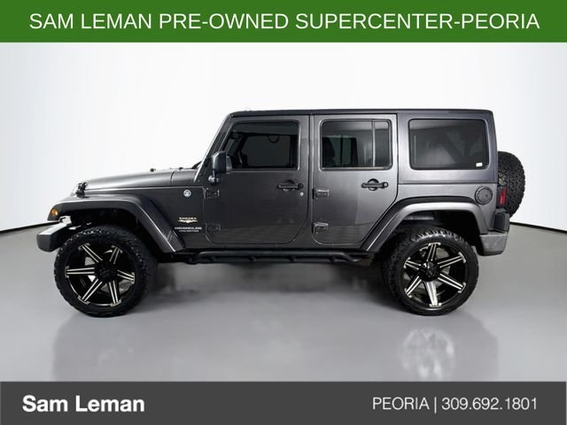 Used 2014 Gray Jeep Unlimited Sahara image 4