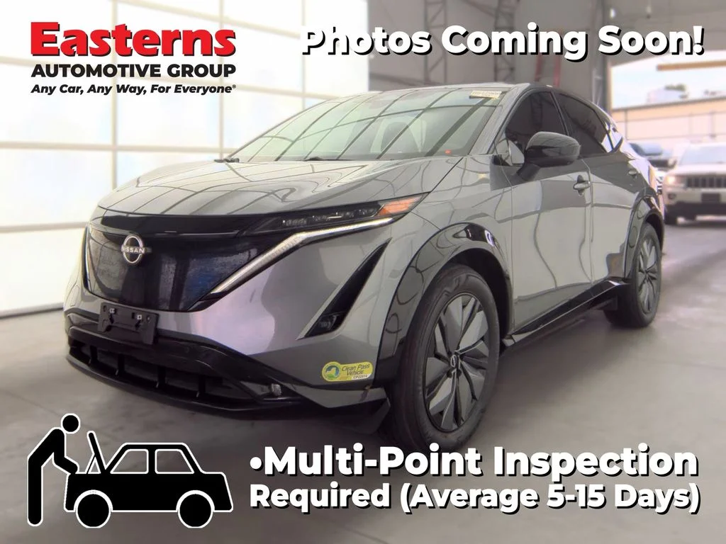 Used 2024 Gray Nissan EVOLVE+ e-4ORCE image 1