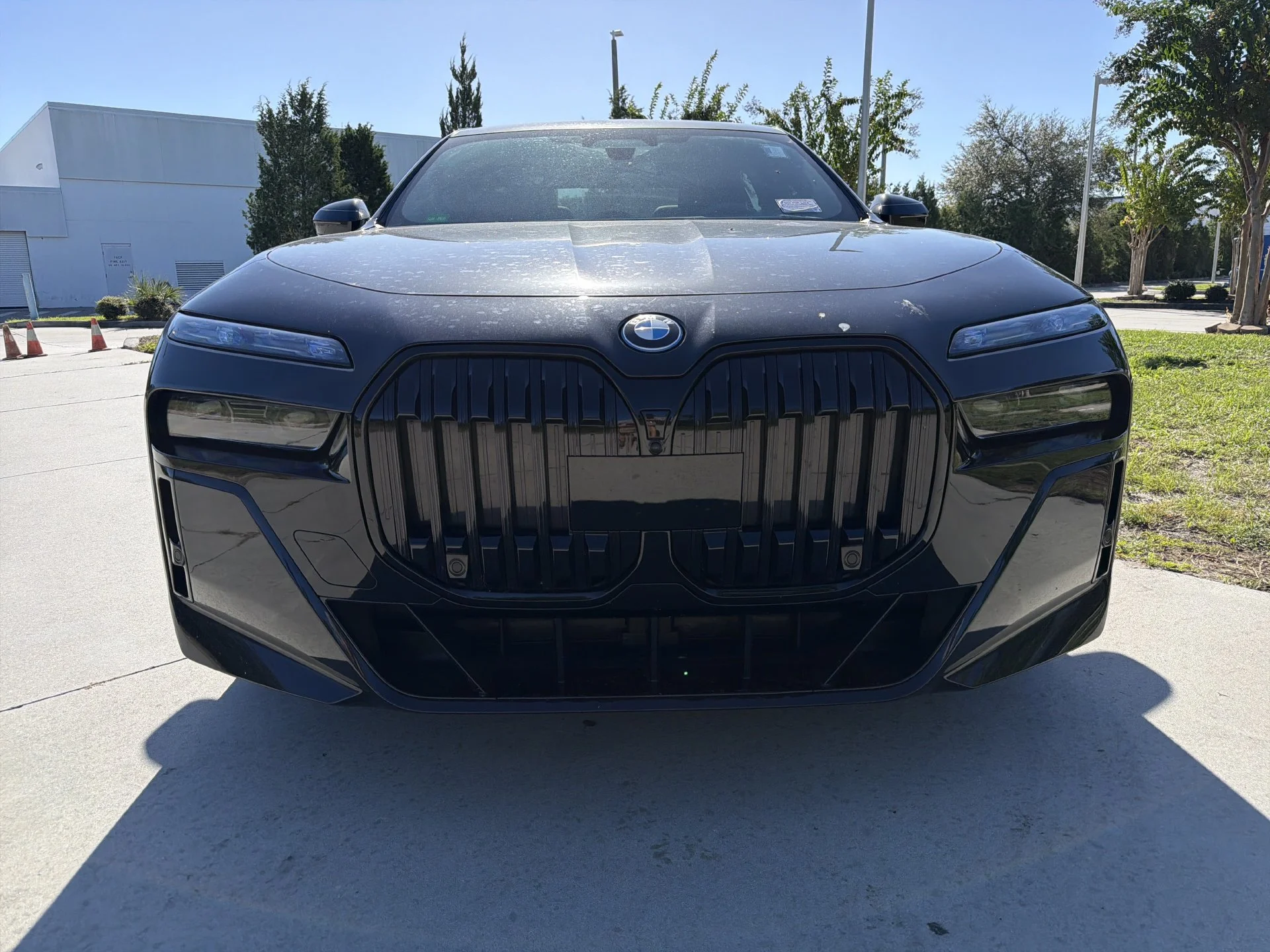 Certified Used 2024 Black Sapphire Metallic BMW xDrive60 image 4