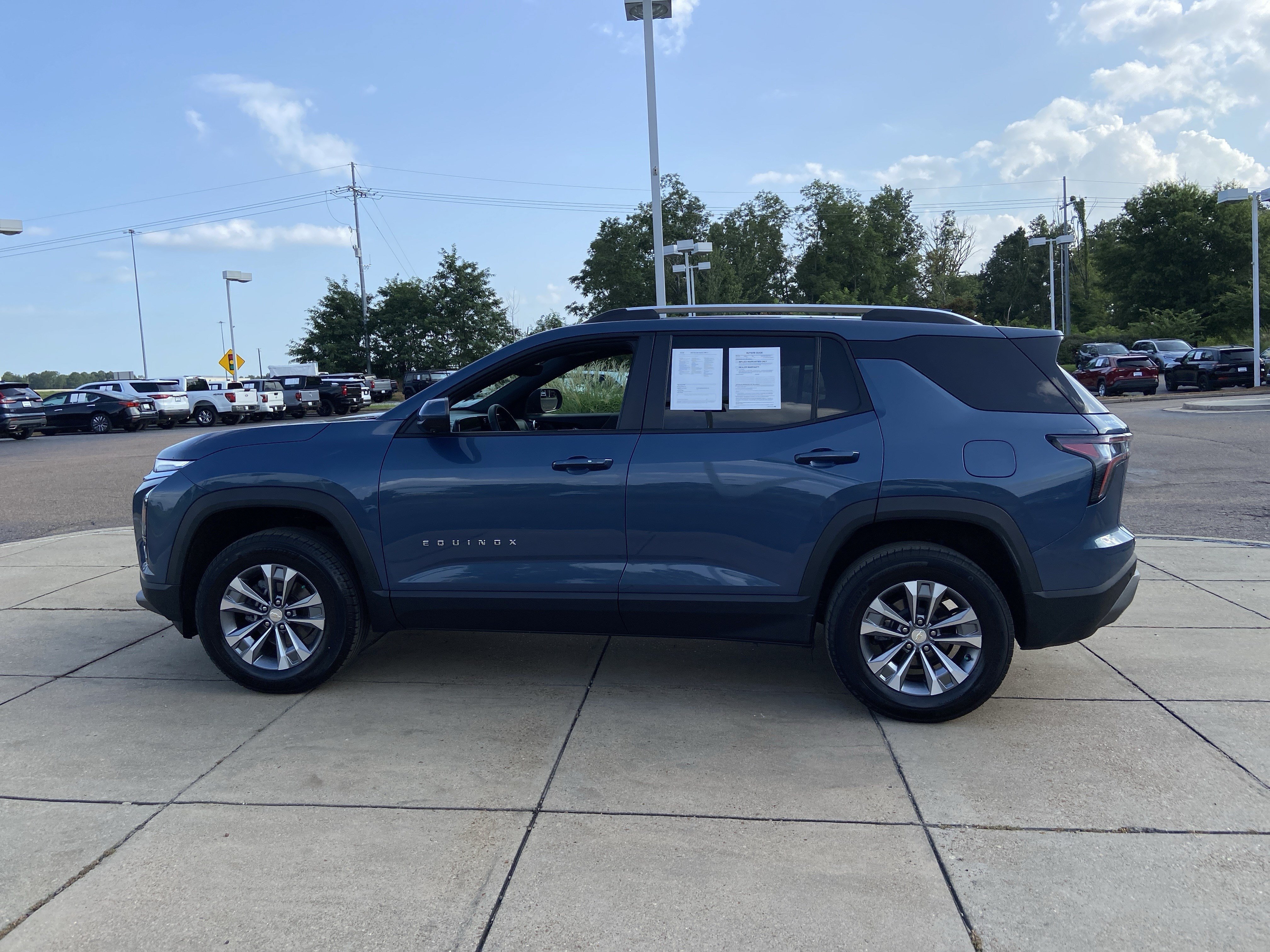 Used 2025 Lakeshore Blue Metallic Chevrolet AWD LT image 7