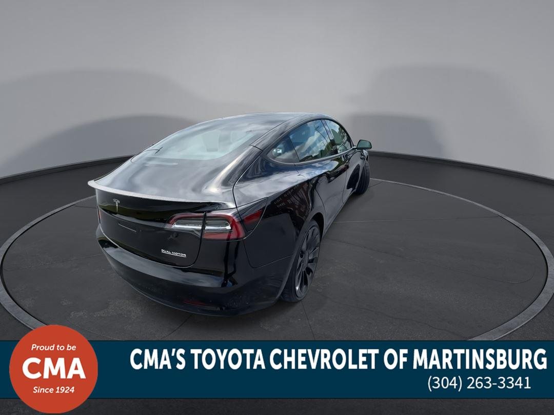 Used 2022 Solid Black Tesla Performance image 8