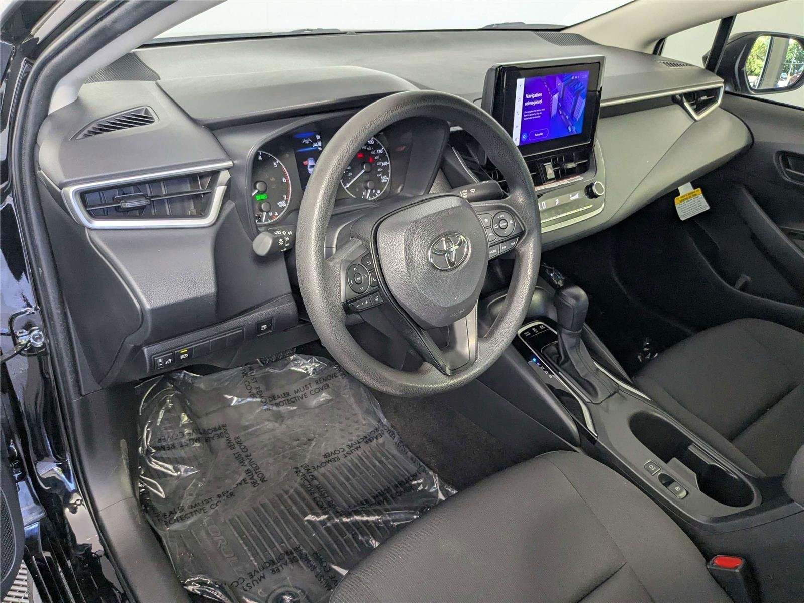 Certified Used 2024 Midnight Black Metallic Toyota Hybrid LE image 14