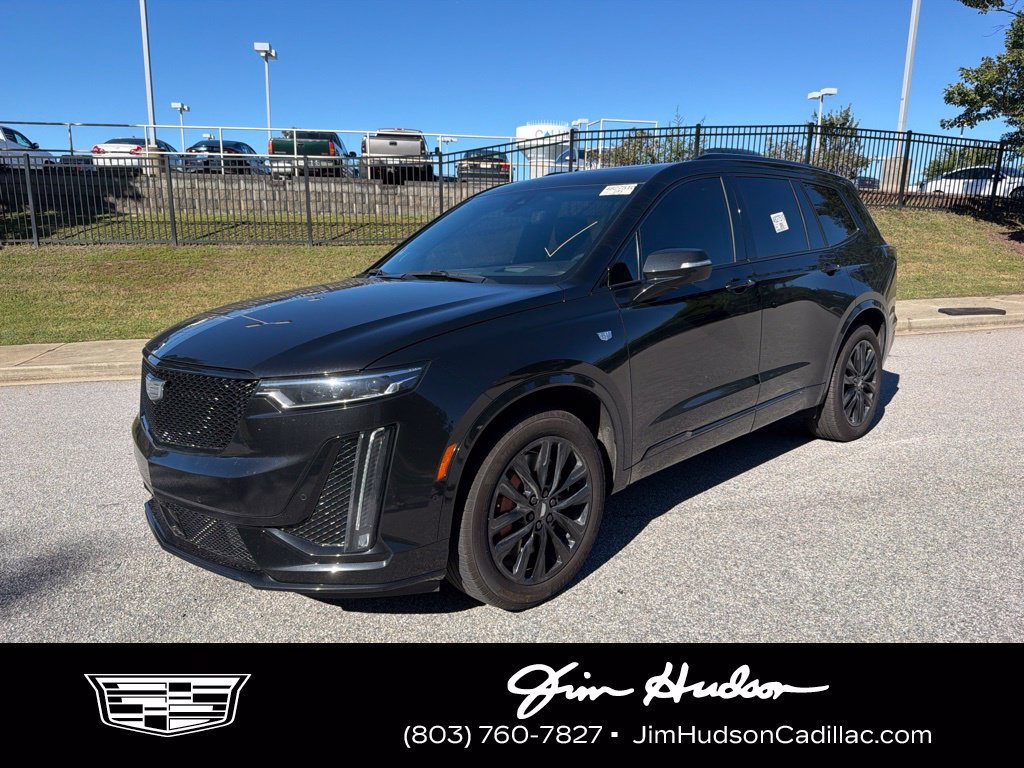 Certified Used 2024 Stellar Black Metallic Cadillac Sport image 1