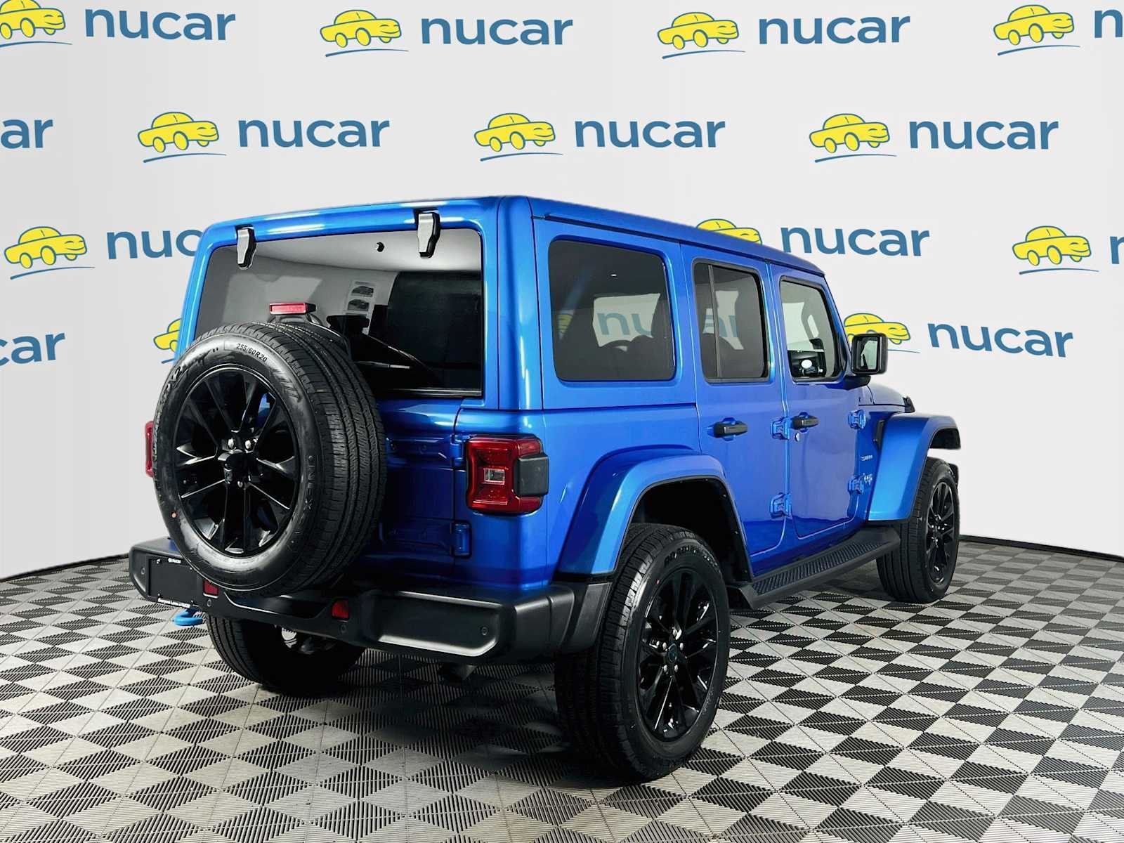 Used 2024 Hydro Blue Pearlcoat Jeep Sahara image 7