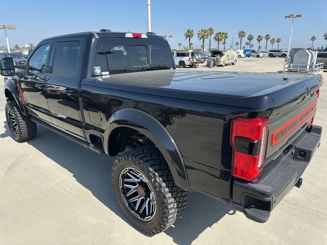 Used 2024 Agate Black Metallic Ford Lariat image 2