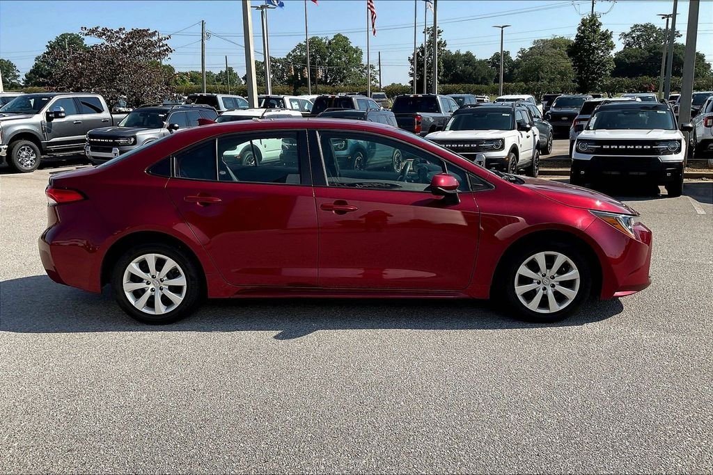 Used 2025 Red Toyota LE image 7
