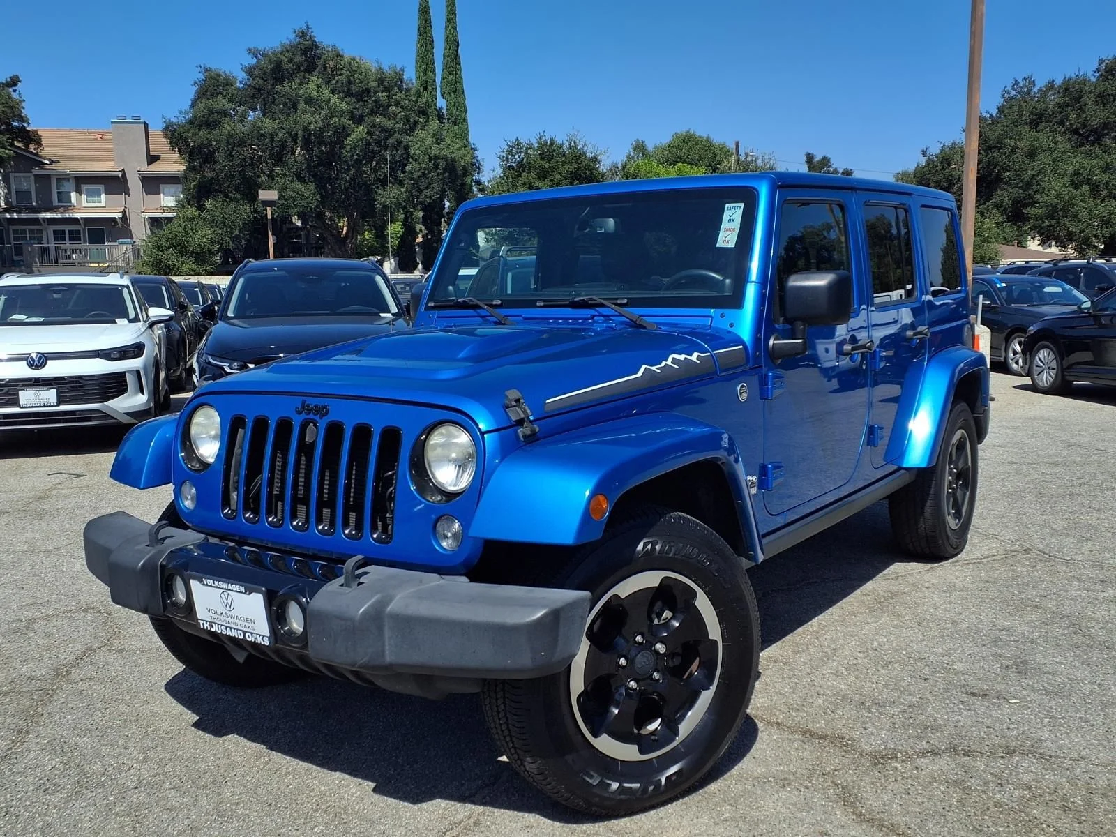 Used 2014 Blue Jeep Unlimited Sahara image 25