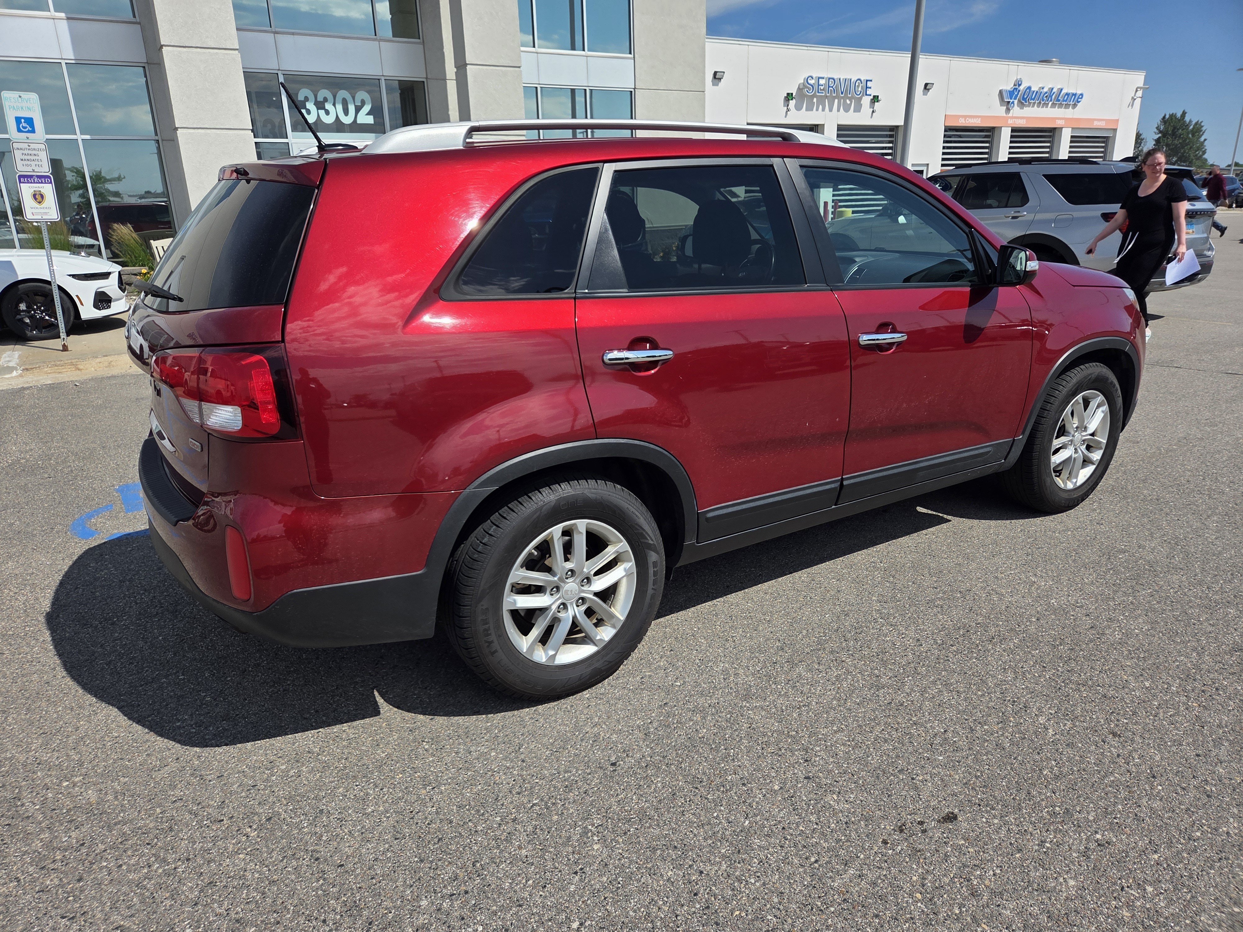 Used 2015 Remington Red Metallic Kia LX image 4