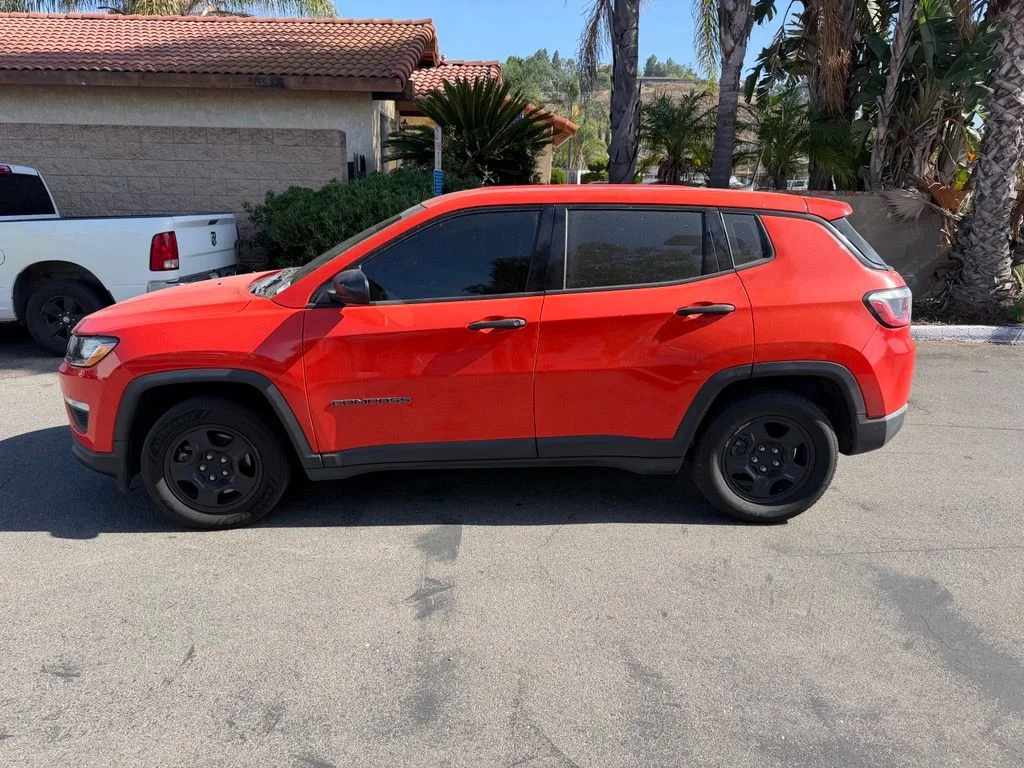 Used 2018 Orange Jeep Sport image 7