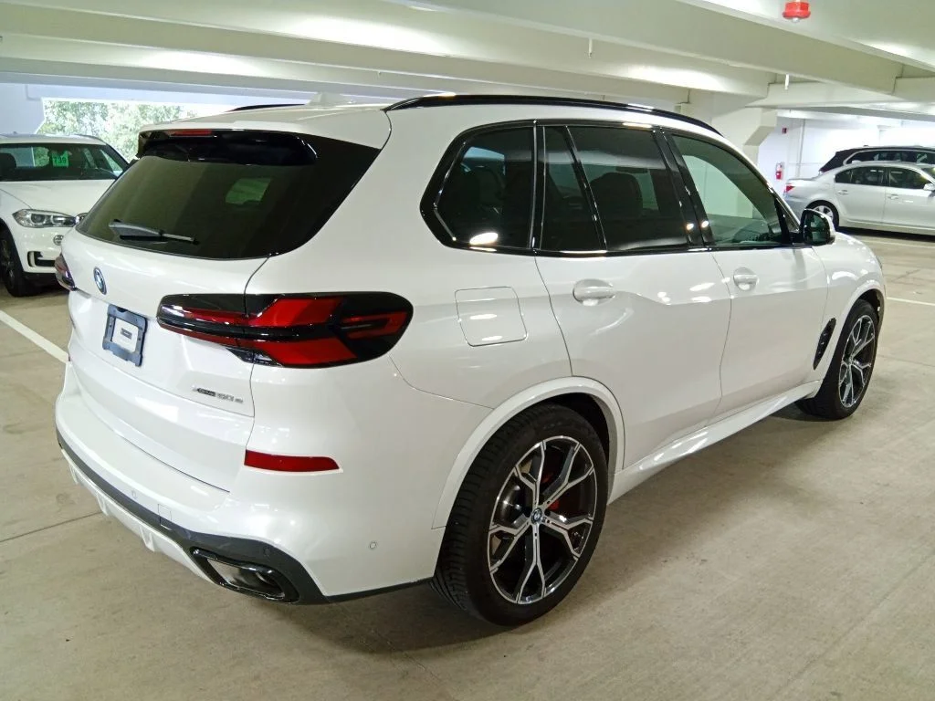 Used 2025 Mineral White Metallic BMW xDrive50e image 5
