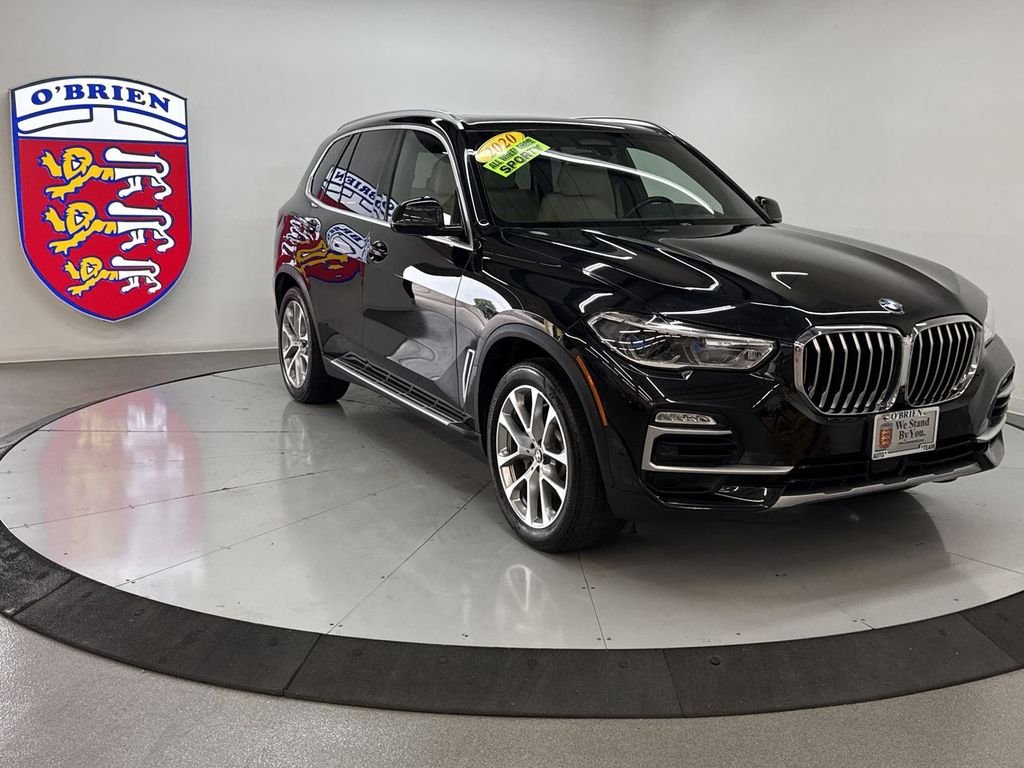Used 2020 Black Sapphire Metallic BMW xDrive40i image 1