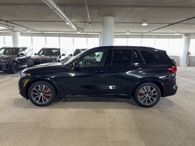 New 2026 Black Sapphire Metallic BMW xDrive50e image 4