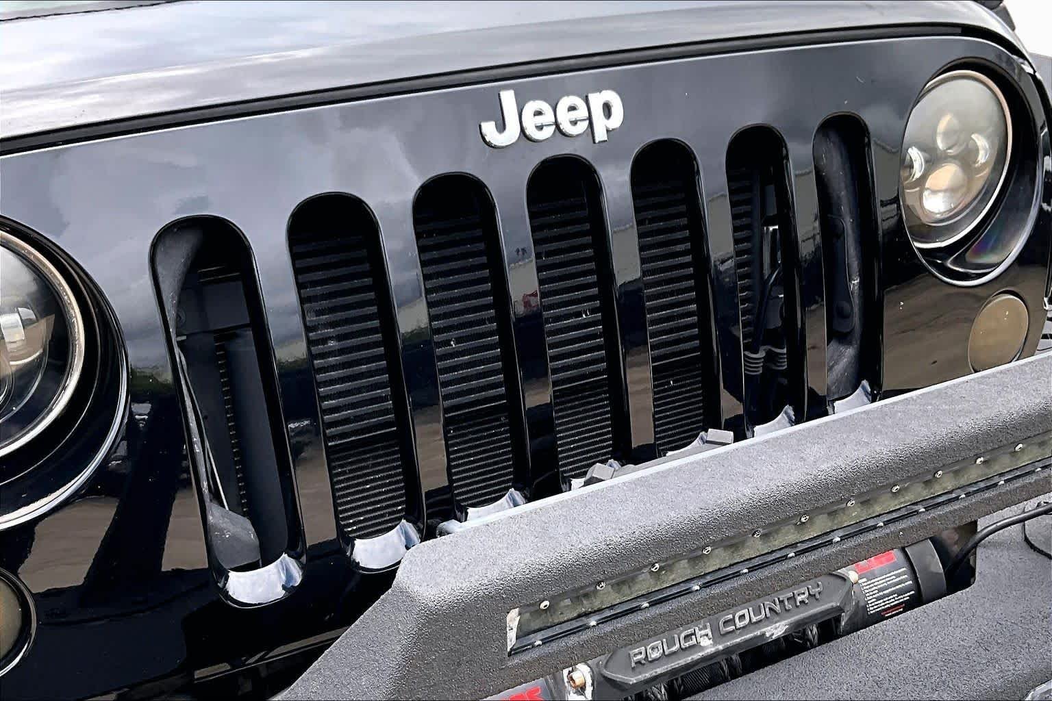 Used 2014 Black Clearcoat Jeep Sport image 29