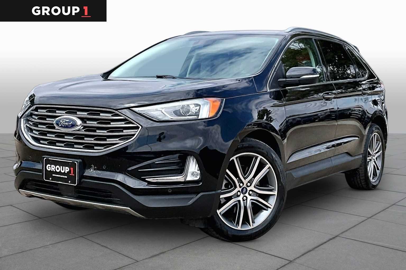 Used 2022 Agate Black Metallic Ford Titanium image 1